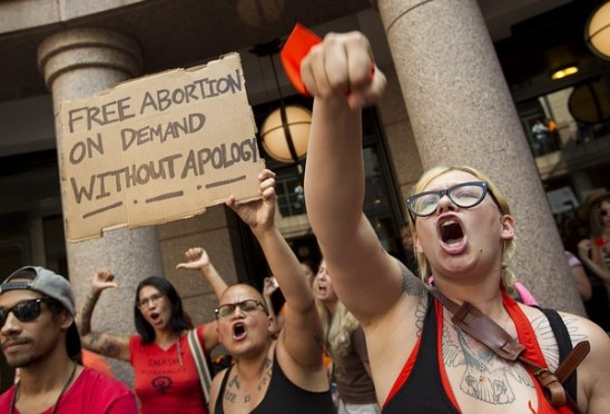 Pro-abortion protesters at the Texas Capitol, opposing a law that would hold abortuaries to the medical standards of surgical centers.